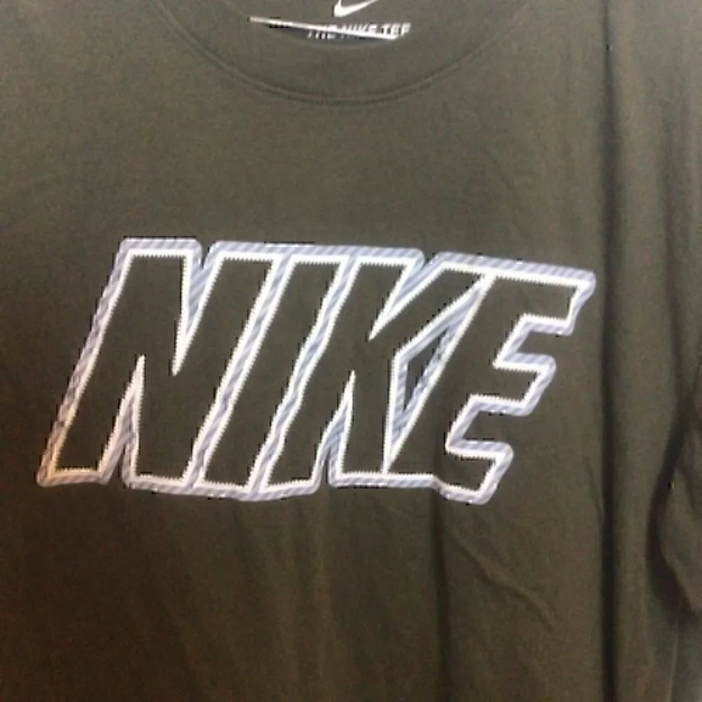 Nike Women’s size medium olive green Nike T-shirt